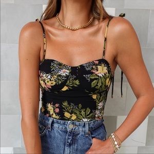 Black floral top. Pairs well with jeans or shorts!